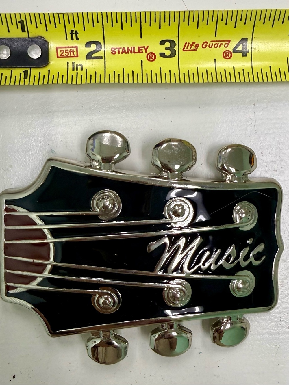 Music Headstock Belt Buckle — Black and Silver
